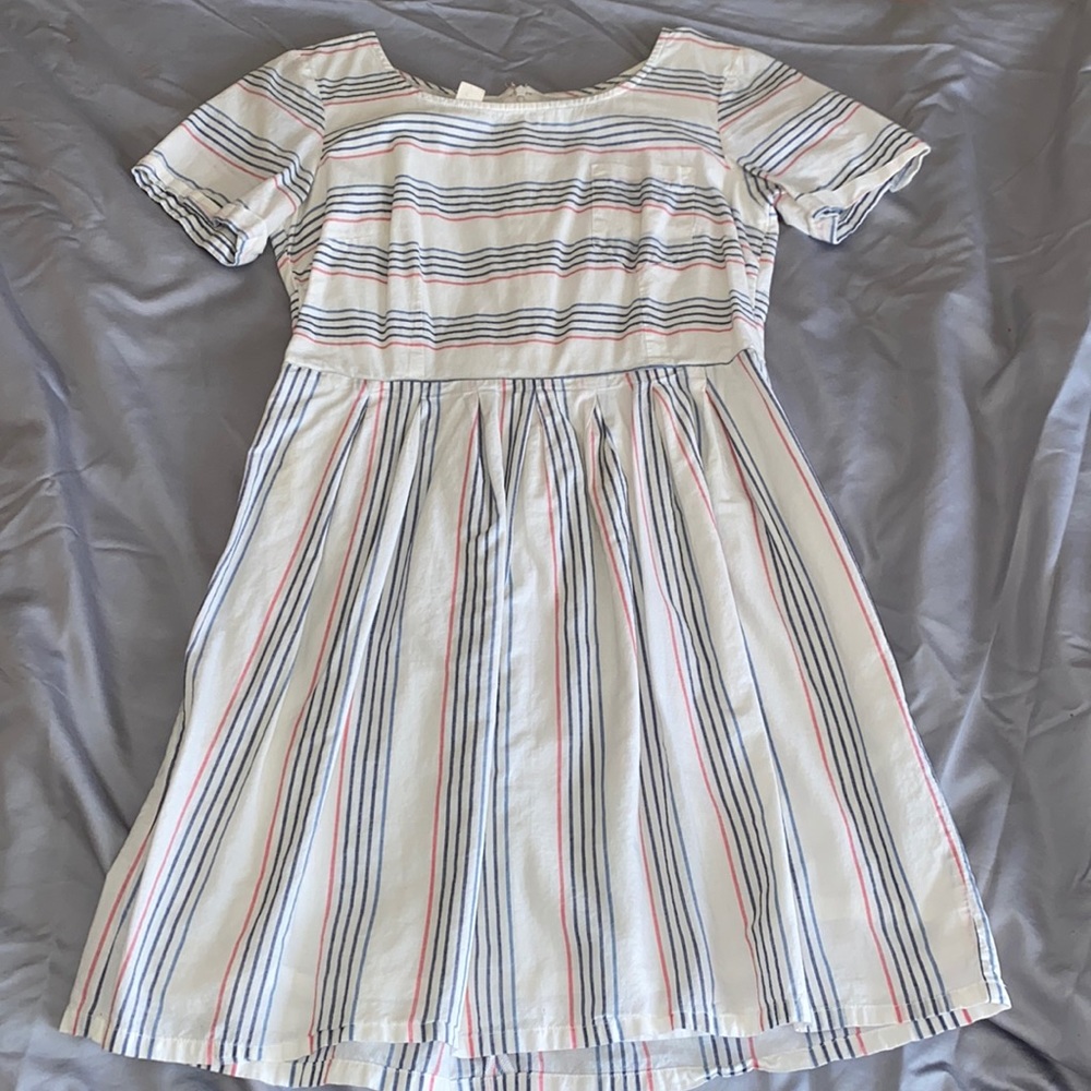 Dress with front pocket detail